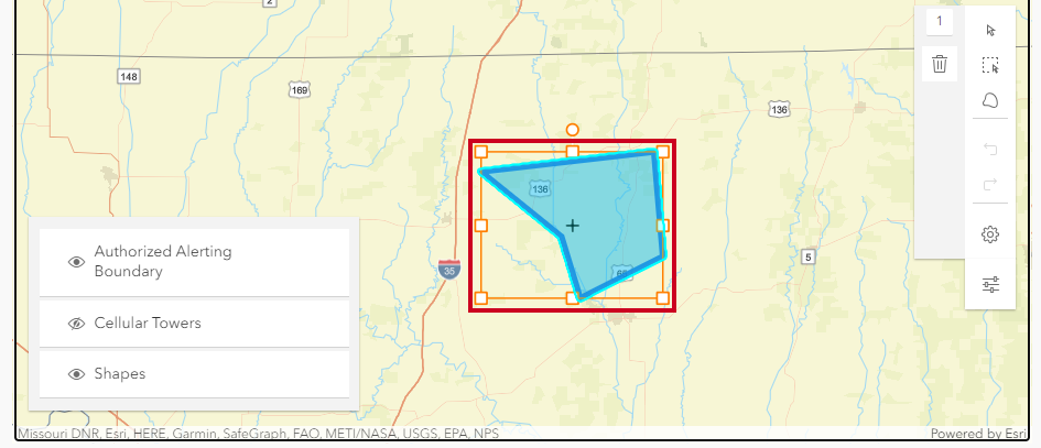 Blue polygon shape defining an example target alerting area with orange sizing handles surrounding it.