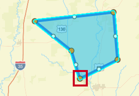Blue polygon shape defining an example target alerting area with orange and white dots along the shape outline.