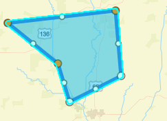 Blue polygon shape defining an example target alerting area with additional dots selected.