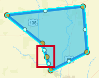 Blue polygon shape defining an example target alerting area with one additional orange dot and two additional white dots along the shape outline.